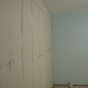 Guest Room wall prepped for paining after the paneling was removed