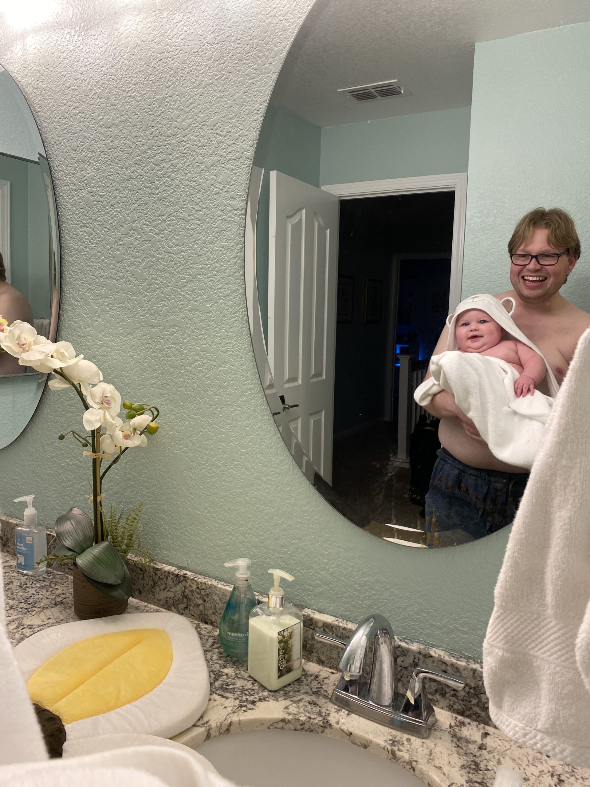 Lily happy with Daddy after her bath